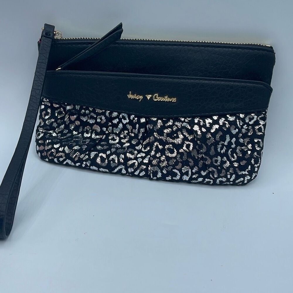 Juicy Couture wristlet animal print minimal wear faux leather.